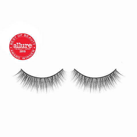 Lithe Lashes Core Collection lash style named 01 Fine and Delicate, a product image displaying the lash pair on its own, floating on a white background and zoomed in and the Allure Best of Beauty winner seal in the upper left of the image, highlighting how beautiful and natural looking the false eyelashes look.