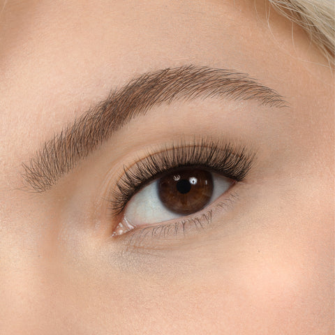Lithe Lashes, Nude Collection, N3 Light & Feathery, a close up eye thumbnail image of the model's eye wearing the false lashes for an up close perspective on how elegant the falsies look on the eye.