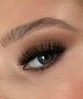 Lithe Lashes Bold Collection Style B3 - Kabuki, a close up eye thumbnail image of the model's eye wearing the false lashes for an up close perspective on how elegant the falsies look on the eye.