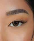 Lithe Lashes Mini Lashes lash style named M2 - Mini Winged, an image of a model's left eye wearing the falsies, showing how natural and beautiful they look.