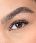 Lithe Lashes, Nude Collection, N2 Minimally Round,  a close up eye thumbnail image of the model's eye wearing the false lashes for an up close perspective on how elegant the falsies look on the eye.